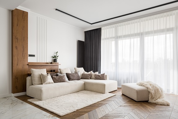 Elegant,And,Comfortable,Designed,Living,Room,With,Big,Corner,Sofa, Obsługa Nieruchomości Kraków.